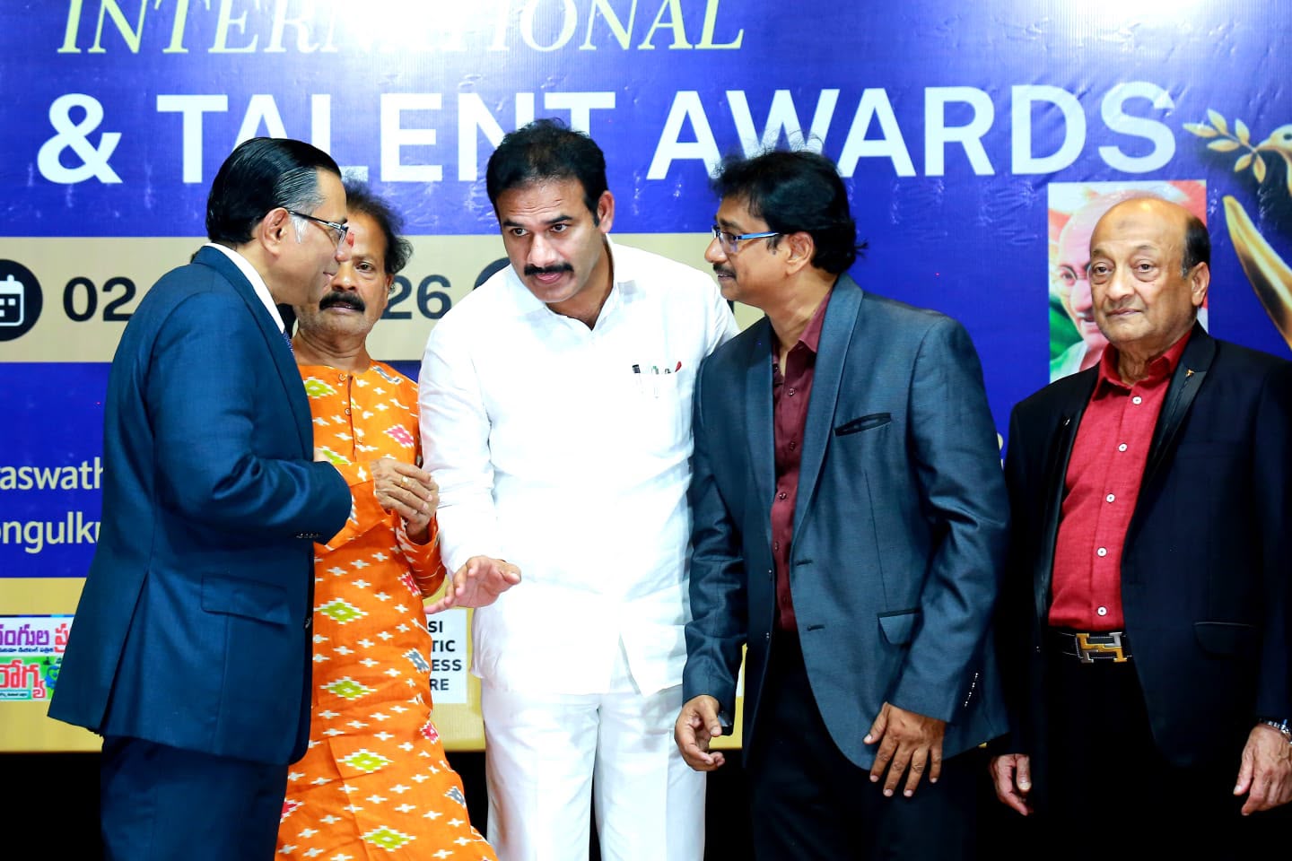 Award ceremony stage with Sri Jatoth Ramchander Naik Garu and dignitaries