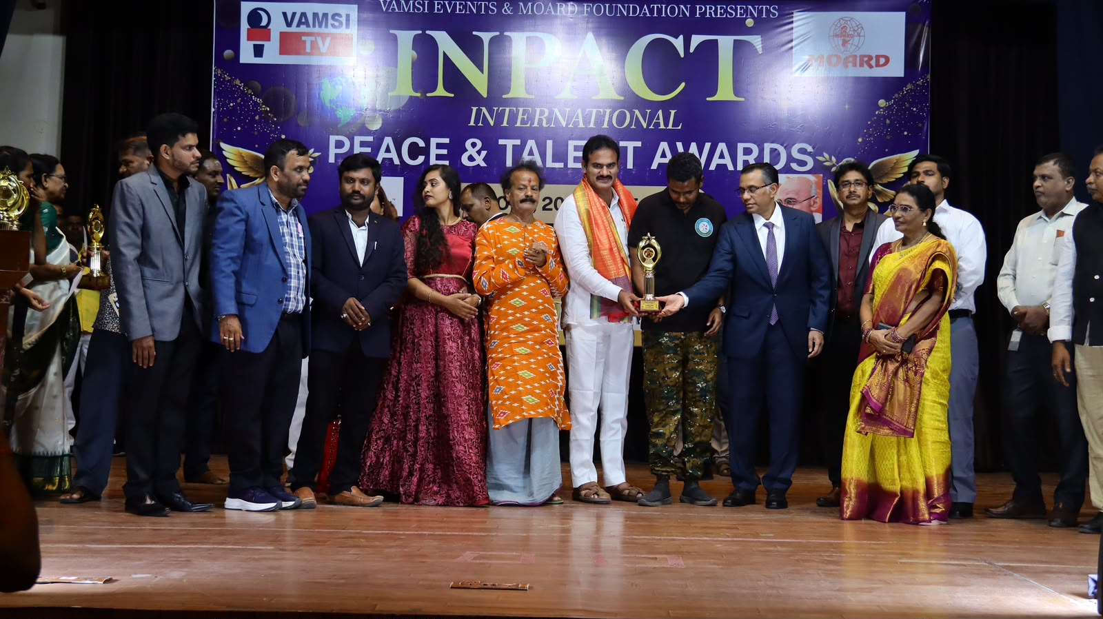 Group photo of award recipients and organizers at the INPACT International Peace & Talent Awards
